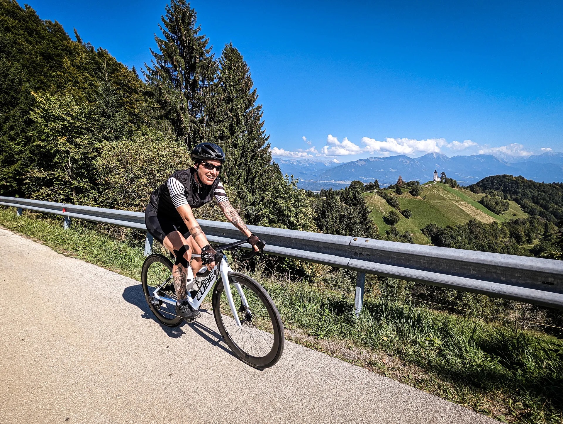 Cycling on Jamnik Climb with the famous church.